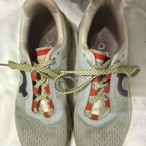 On Running Gray and Red Athletic Shoes